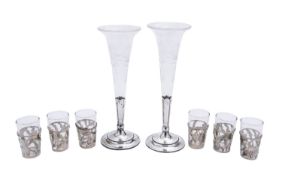A mixed group of silver and glass including; a set of six shot glasses with Sterling silver mounts,