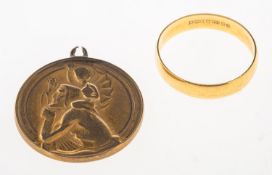 A 9ct gold St Christopher and an 18ct gold wedding band, the St Christopher, UK hallmark,