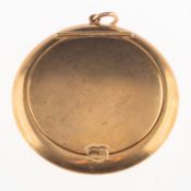An early 20th century 9ct gold powder compact with mirror, UK hallmark, Birmingham, 1918,