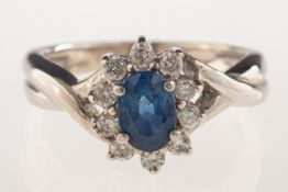 A sapphire and diamond cluster ring,