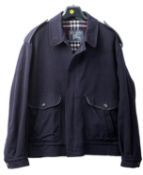 Burberry. Two Burberry coats.