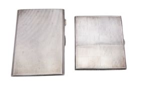An Art Deco silver cigarette case by Edwin Joseph Houlston Birmingham 1945, of rectangular form,