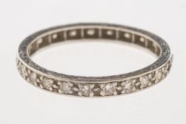 A full diamond eternity ring, set with twenty-two single-cut diamonds (one diamond missing),