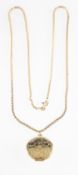 A locket and chain, the locket of circular form with floral and foliate engraving, top opening,