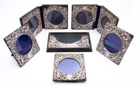 A collection of silver photograph frames including;