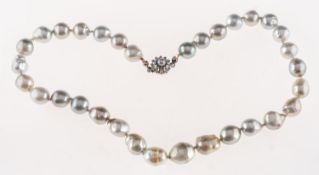 A baroque pearl necklace, the pearls are of baroque shape with blue, silver and grey overtones,