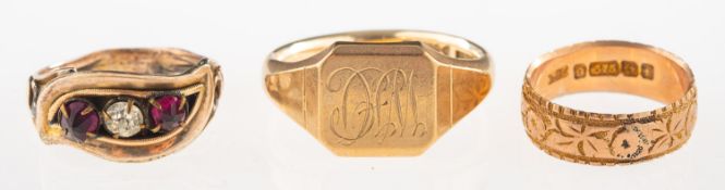 A group of three rings, including a Georgian memorial ring set with three paste stone,