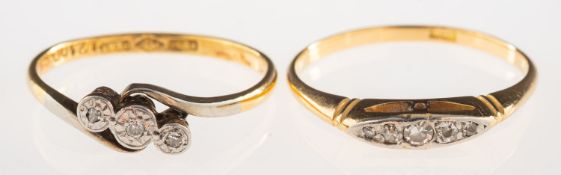 Two diamond set rings, including a ring set with five graduated old-cut diamonds, marked 18K,