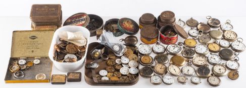 A quantity of various wrist and pocket watch parts to include three large tins of wristwatch