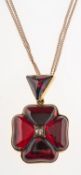 An antique quatrefoil garnet pendant,