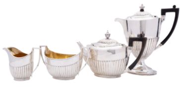 A Victorian silver four piece tea and coffee service by Walter & John Barnard, London 1885/6,