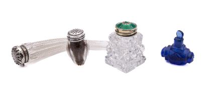 A mixed group of silver and glass bottles including;