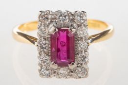 An 18ct gold ruby and diamond cluster ring,