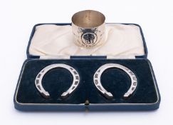 An unusual lady's Bisely shooting trophy napkin ring by Elkington & Co Ltd, Birmingham 1911,