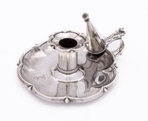 A George IV silver chamberstick and snuffer by WE probably William Eaton, London 1822,