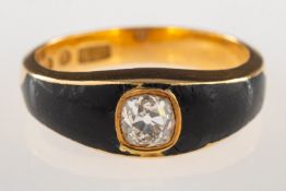 An 18ct gold Victorian diamond and enamel ring, set with a single old mine-cut diamond,