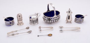 A mixed group of silver including; a glass lined swing handle bonbon dish Chester 1897,