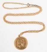 A St. Christopher pendant with chain, a double sided St.