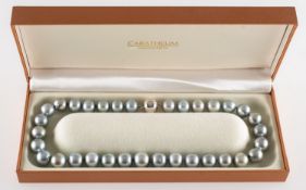 A Tahitian pearl necklace, a string of silver grey Tahitian pearls, pearls range from approx. 12.