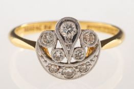 An Art Deco diamond ring, grain and milgrain set with a mix of older-cut diamonds, diamonds approx.