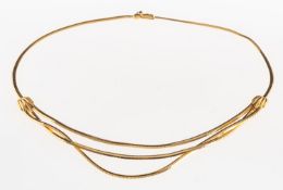An omega link necklace, of square faceted omega links, the central section made up of three strands,
