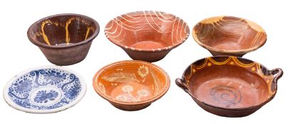 Five terracotta clip decorated dishes, t