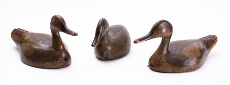 Three carved and painted wood decoy duck