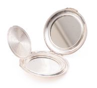 A George VI silver powder compact by Coh