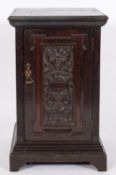 A late Victorian/Edwardian dark oak pede