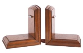 A pair of walnut 'StayPut' bookends in a