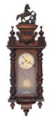 A Vienna-style German wall clock having