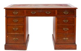 An Edwardian mahogany pedestal desk, the
