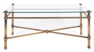 A brass and glass coffee table, modern;