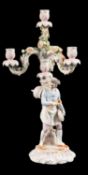 A German porcelain figural candelabrum,