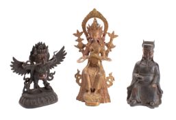 Three Oriental metal figures, 20th centu