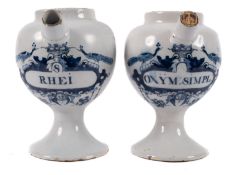 A pair of Dutch delftware blue and white