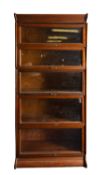 An oak and glazed sectional stacking boo