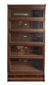 An oak and glazed sectional stacking boo