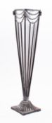 A glass and metal mounted vase centrepie