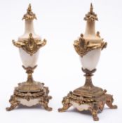 A pair of Continental alabaster and gilt