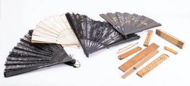 A collection of four hand fans; comprisi