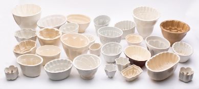 A large quantity of pottery jelly moulds