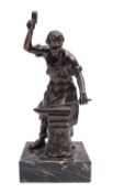 A patinated metal sculpture portraying a