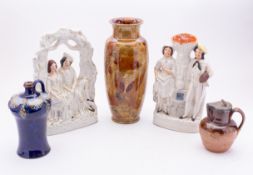 Three pieces of Royal Doulton stoneware,