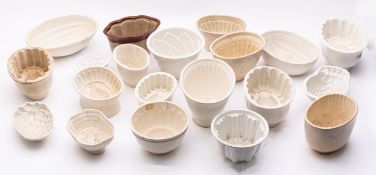 A group of pottery jelly moulds, primari