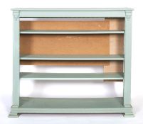 An Edwardian later green painted open bo