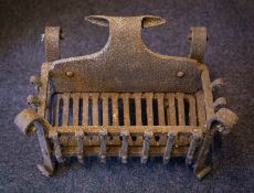 A wrought iron fire basket, circa 1900;