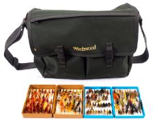 A Wychwood Fly Fishing bag, two plastic
