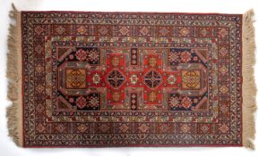 An Indo Persian rug, the rust geometric