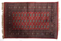 A Pakistan rug, the rose field with thre